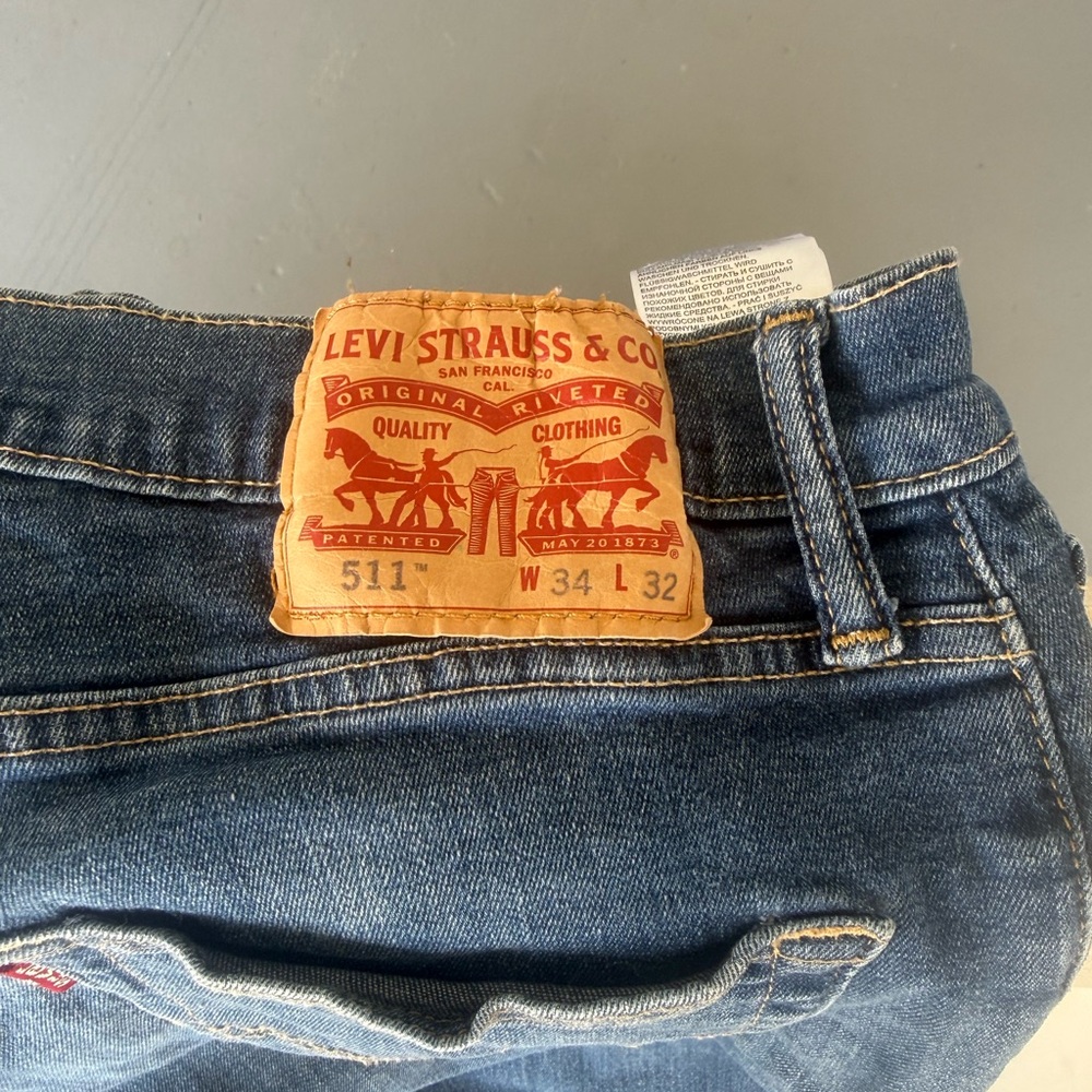 Levi's 511 Straight Jeans in Dark Blue with Tan Leather Patch 34 waist 32 length